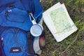 Backpack and map. Royalty Free Stock Photo