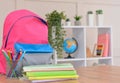 Backpack, school supplies on the background of the school classroom .Back to school and kindergarten . The beginning of the school Royalty Free Stock Photo