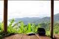 Backpack with tablet on floor terrace looking view and space for your Summer trip holiday background Royalty Free Stock Photo