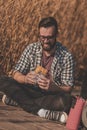 Backpacker eating a sandwich while taking a break Royalty Free Stock Photo