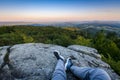 Backpacker at first lights of the day, Roche d Ajoux, Beaujolais, France Royalty Free Stock Photo