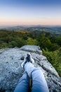 Backpacker at first lights of the day, Roche d Ajoux, Beaujolais, France Royalty Free Stock Photo