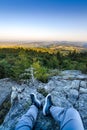 Backpacker at first lights of the day, Roche d Ajoux, Beaujolais, France Royalty Free Stock Photo