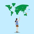 backpacker girl stand in front of world map