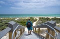 Man hiker walking to the beach.