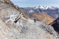 Backpacker hiking people mountain trail, Bolivia tourism. Royalty Free Stock Photo