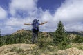 Backpacker with hands out Lost Creek Wilderness