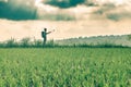 Backpacker makes selfie among rice fields on a cloudy day. retro toning colors