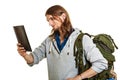 Backpacker man using pc tablet browsing internet. Royalty Free Stock Photo