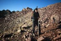 Backpacker in morning mountains Royalty Free Stock Photo