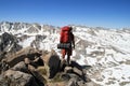 Backpacker on mountain Royalty Free Stock Photo