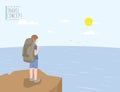 Backpacker standing on a cliff looking out to the sea view. On a