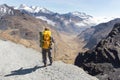 Backpacker standing hiking tourist mountain edge trail, Bolivia Royalty Free Stock Photo