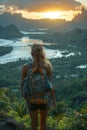 Backpacker standing at a scenic overlook