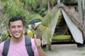 Backpacker staying in tropical beach bungalow Royalty Free Stock Photo