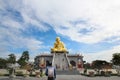 Backpacker visit beautiful buddish place call Luang Poo Tim and cloundy sky at Wat Lahan Rai