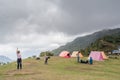 Backpackers having rest in the tent camp Royalty Free Stock Photo