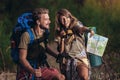 Backpackers hiking on the path in mountains