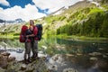 Backpackers are resting while hiking in mountains