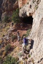 Backpackers on a steep, narrow trail in the Grand Canyon.