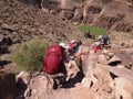 Backpackers on a steep section of the Tonto Trail in the Grand Canyon.