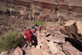 Backpackers on a steep section of the Tonto Trail in the Grand Canyon.