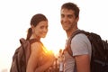 Backpacking...see the world one step at a time. a young couple touring a foreign city. Royalty Free Stock Photo