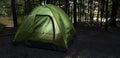 Backpacking tent in a dark campsite Royalty Free Stock Photo