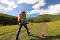 Woman hiking in prairie mountains