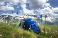 Backpacks and mountain walking sticks in hiking trail. Hiking in mountains concept. Sport tourism. Royalty Free Stock Photo