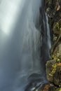 Backside of Campbell Falls with blurred motion of the waterfall, Connecticut. Royalty Free Stock Photo