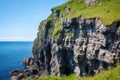 backside of a cliff with jagged rock edges