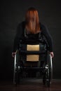 Backside of disabled person.