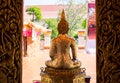 The backside of golden buddha statue