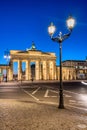 The backside of the illuminated Brandenburg Gate in Berlin at dawn Royalty Free Stock Photo