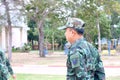 The backside view of Thai soldier in his outdoor uniform with hi