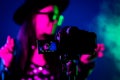 Backstage how operator working with professional camera. Videographer shoots music clip with actress or singer celebrity