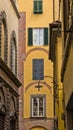 Backstreet with typical italian houses in Lucca, Tuscany