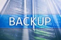 Backup button on modern server room background. Data loss prevention. System recovery Royalty Free Stock Photo