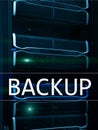 Backup button on modern server room background. Data loss prevention. System recovery