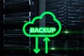 Backup button on modern server room background. Data loss prevention. System recovery