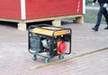 Backup Portable Generator for repair. Mobile Backup Generator on house construction site