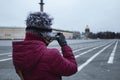 Young woman in mask walk in the city. Empty dvortsovaya square in the centre on self isolation