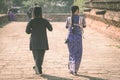 Backview of female tourists at ancient Pa Hto Taw Gyi Pagoda ruins at Mingun city Royalty Free Stock Photo