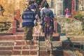 Backview of female tourists at ancient Pa Hto Taw Gyi Pagoda ruins at Mingun city Royalty Free Stock Photo