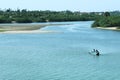 Backwater with fishermen boat Royalty Free Stock Photo