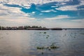 Backwater view with houseboats and blue sky