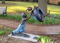 Backyard Adventure by Missy Vandable, bronze sculpture in Edmond, Oklahoma