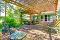 Backyard farm deck with attached open pergola Royalty Free Stock Photo