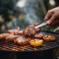 Backyard grilling Mans hand tends barbecue with smoked flavors
